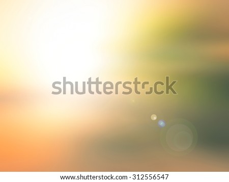 Abstract blurred textured background: yellow orange and green patterns. Blurred nature background. Beautiful oceans and bright sun light. Summer Holidays, World Environment, Earth Day concept.
