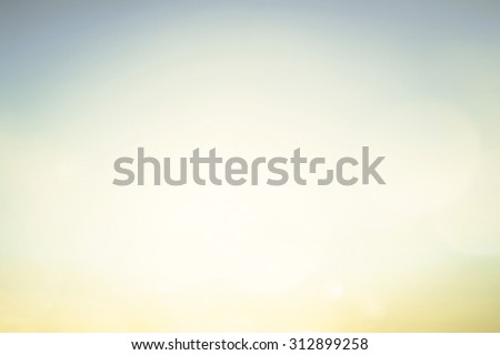 Abstract blurred textured background: yellow green and blue patterns. Blurred nature background. Beautiful oceans and bright sun light. Summer Holidays, World Environment, Earth Day concept.