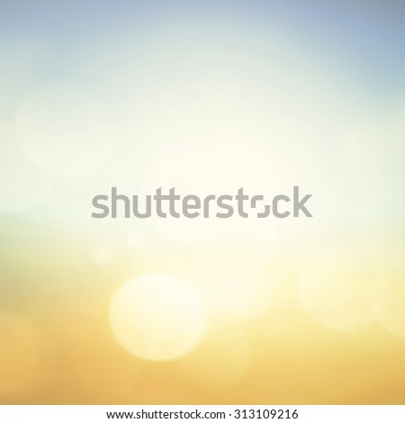 Abstract blurred textured background: orange and blue patterns. Blurred nature background. Beautiful oceans and bright sun light. Summer Holidays, World Environment, Earth Day concept.