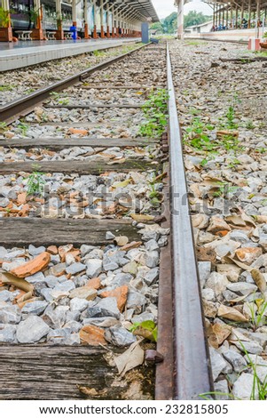 image of Railway lines travel through a railway station.