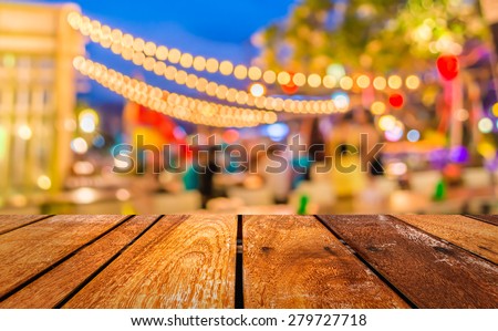 Artistic style - Defocused night street abstract texture ,blurred background with bokeh of  city on street at night.