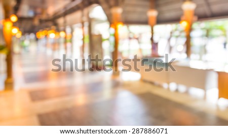 blurred background. street market decorated with festive lights .