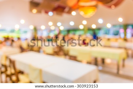 image of blur people  in restaurant  with bokeh for background usage .