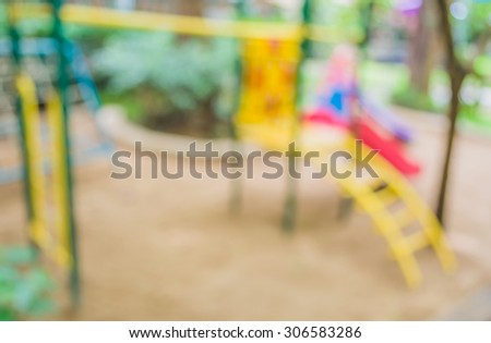 Defocused and blur image of children's playground at public park for background usage.