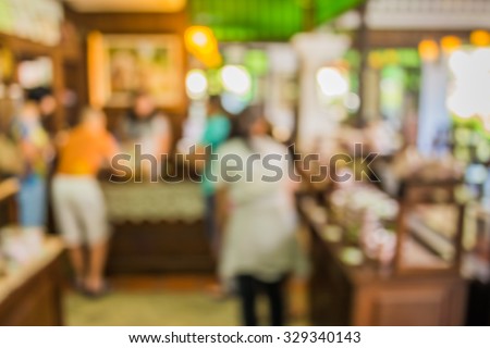 image of blurred bakery shelf in coffee shop for background usage .