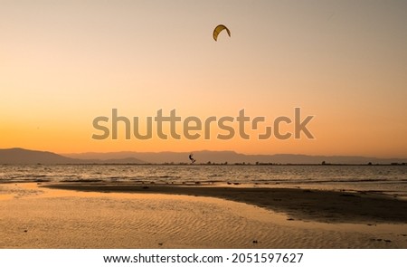 Similar – Image, Stock Photo Unrecognizable athlete practicing surfing on ocean wave