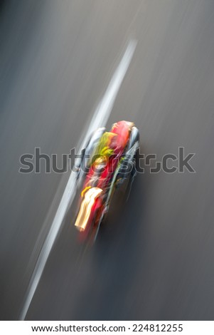 Bike rides on the road at high speed Motorcycle riding Speed line Slow shutter speed