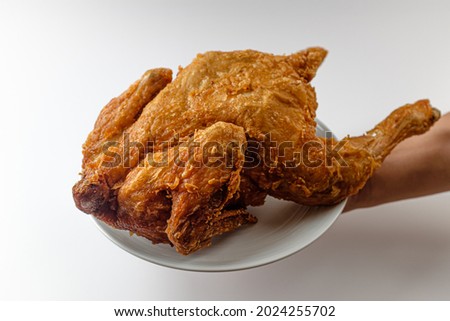 Fried whole chicken on a white background Foto d'archivio © 