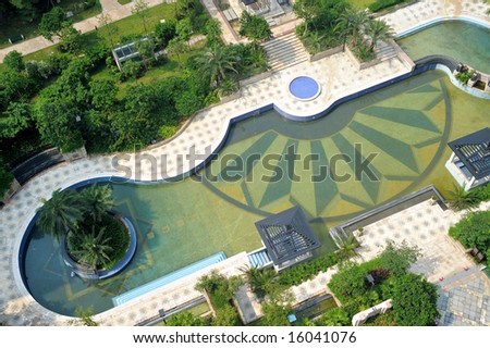 The aerial view of a modern garden pool.