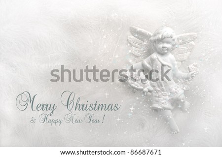 Contemporary christmas card in white and silver with angel