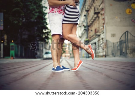 Fashionable cool couple, legs, lifestyle
