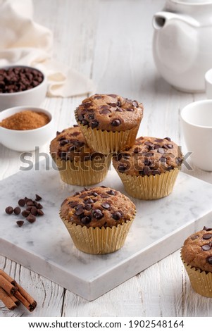 Similar – Foto Bild Schokoladenmuffins und Kaffeetasse auf dunklem Hintergrund