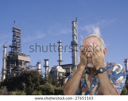 Senior man refusing to see oil refinery. Concept of global warming.