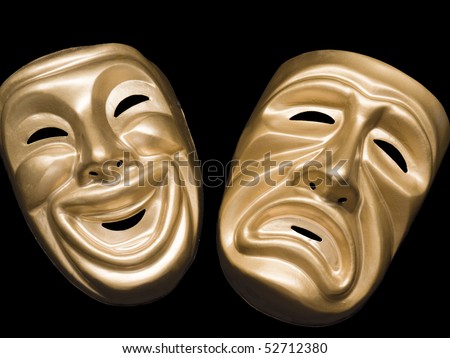 Gold metallic comedy and tragedy masks on black