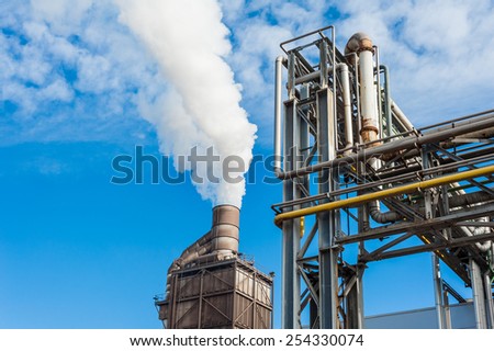 Chemical plant for the treatment of chipboard for furniture factory, with chimney