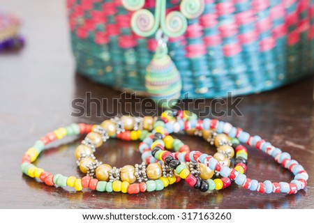 Various bracelets colorful plastic beads. Costume jewelry for  woman