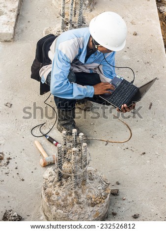 BANGKOK THAILAND- NOVEMBER 22: unidentified man work seismic test on November 22, 2014 at Nong Chok Substation in Bangkok,Thailand.
