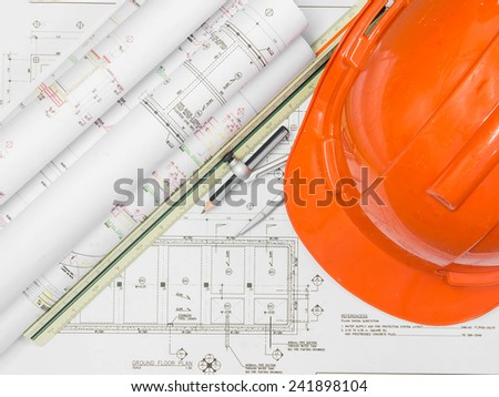 Architectural blueprint of office building with a pencil