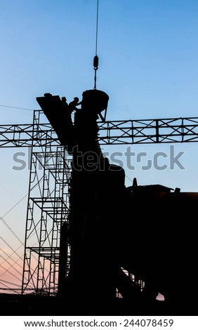 Working man construction silhouette in substation