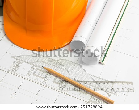 Architectural blueprint of office building with a pencils
