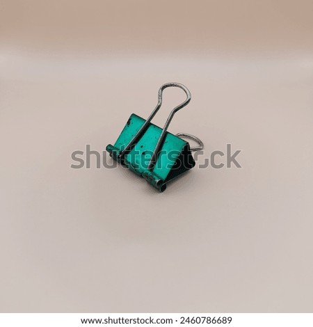 Similar – Foto Bild Ein Binder Clips Kreis auf blauem Hintergrund