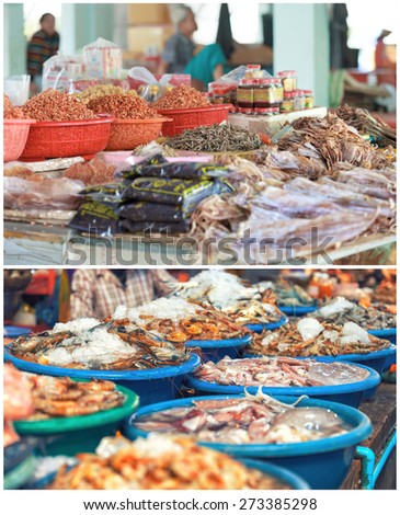 Traditional asian fish market stall full of fresh and dried seafood