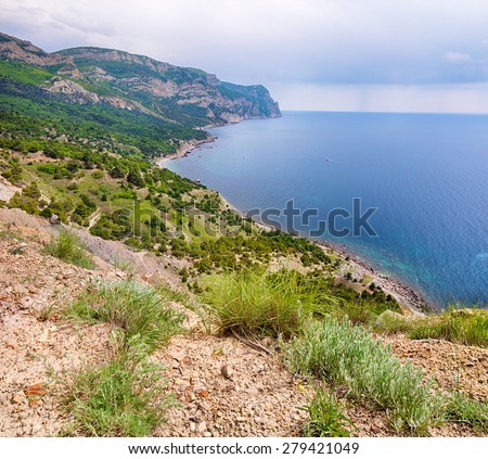 Rocky beach of Crimea, view over the sea