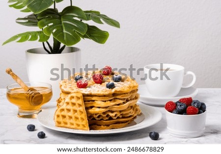 Similar – Image, Stock Photo Blueberries and honey on dark background, top view