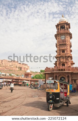 JODHPUR, INDIA - MAY  10, 2014: Unidentified locals shop at a market under the clock tower on May  10, 2014 in Jodhpur, India. Jodhpur is known as the blue city.