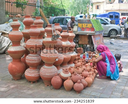 JODHPUR, INDIA - MAY  17, 2014: Unidentified people in Indian street market on May  17, 2014  in Jodhpur, India.  City is popular tourist destination in Rajasthan with population of 1,210,000