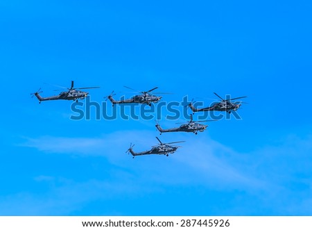 MOSCOW/RUSSIA - MAY 7: 2 Mil Mi-28N (Havoc) attack helicopters of aerobatic team Berkuty fly on rehearsal of parade devoted to 70-th Victory Day aniversary on May 7, 2015 in Moscow.