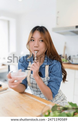 Similar – Image, Stock Photo a woman enjoys after a hiking trip the achieved view on sea and rocks in the sun