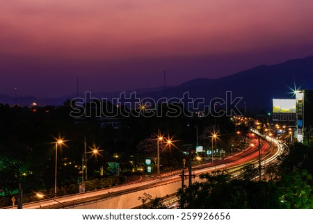 Bird eye view above Chiengmai city in night, Thailand.