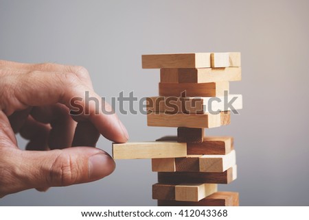 Similar – Image, Stock Photo Businessman with wooden blocks and red arrow