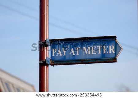 Pay at meter sign in car park
