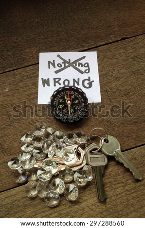 picture of compass and key with something shining show idea that business go wrong direction  and  got nothing