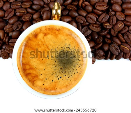 Cup of fragrant and delicious coffee and coffee beans