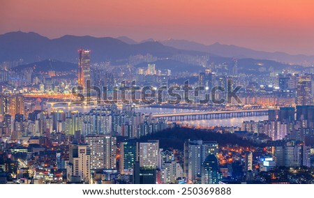 The sun set and the skyscrapers of Seoul, South Korea.