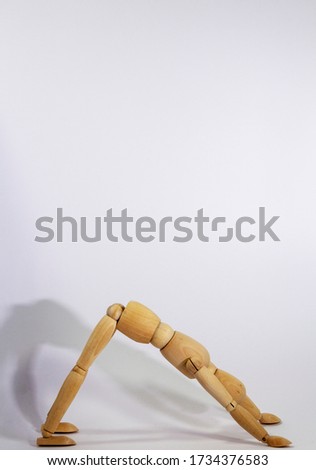 Similar – Image, Stock Photo wooden doll during yoga practice Ansanas, triangle Trikonasana, in front of white background