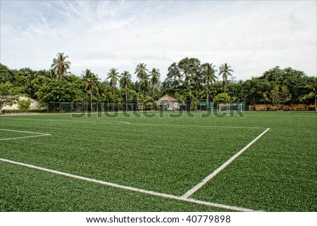 An artificial football pitch at the center of Meeru Island, The Maldives.