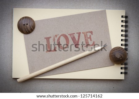 Notebook and pencil  with love card