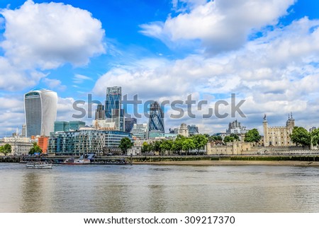 London, United Kingdom - August 22, 2015: City of London skyline, including the Tower of London and the skyscrapers 122 Leadenhall Street, Tower 42, 30 St Mary Axe and 20 Fenchurch Street.