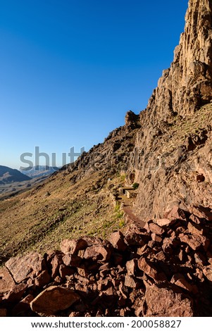 Egypt, Sinai, Mount Moses. Road on which pilgrims climb the mountain of Moses and mountain hut near the road.