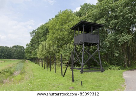 HOOGHALEN, NETHERLANDS - JULY 10: Watchtower at former concentration camp Westerbork on July 10, 2011 in Hooghalen, Netherlands. Westerbork was a World War II Nazi refugee, detention and transit camp.
