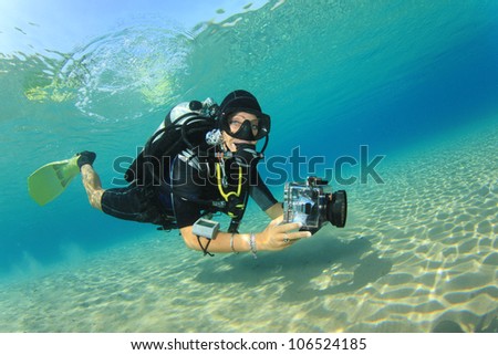 Beautiful Woman Scuba Diver in the Ocean