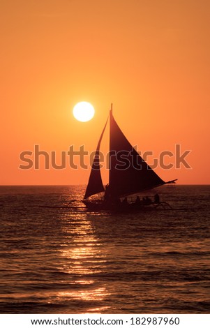 Traditional Island Sailboats go out for Sunset Cruises