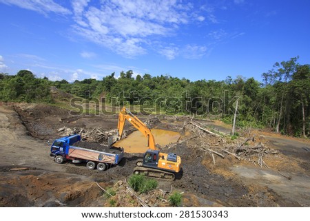 KUCHING, MALAYSIA - MAY 25 2015: Deforestation. Environmental damage to rainforest in Borneo, nature destroyed for oil palm plantations and construction.