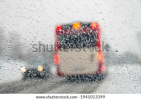 Similar – Image, Stock Photo Passenger perspective rainy weather in the right side mirror