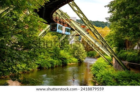 Similar – Image, Stock Photo Wuppertal suspension railway, monorail above the Wupper.