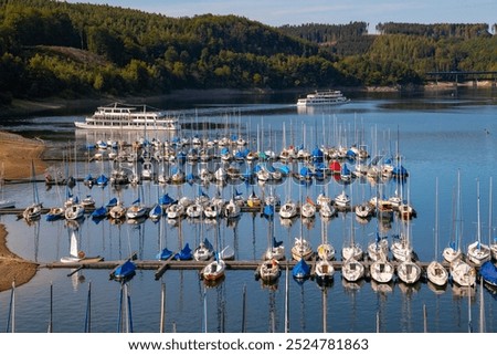 Similar – Foto Bild Bootssteg oder Badesteg aus schönem alten Holz im Sommer bei Sonnenschein am Alpsee in Schwangau bei Füssen im Allgäu im Freistaat Bayern